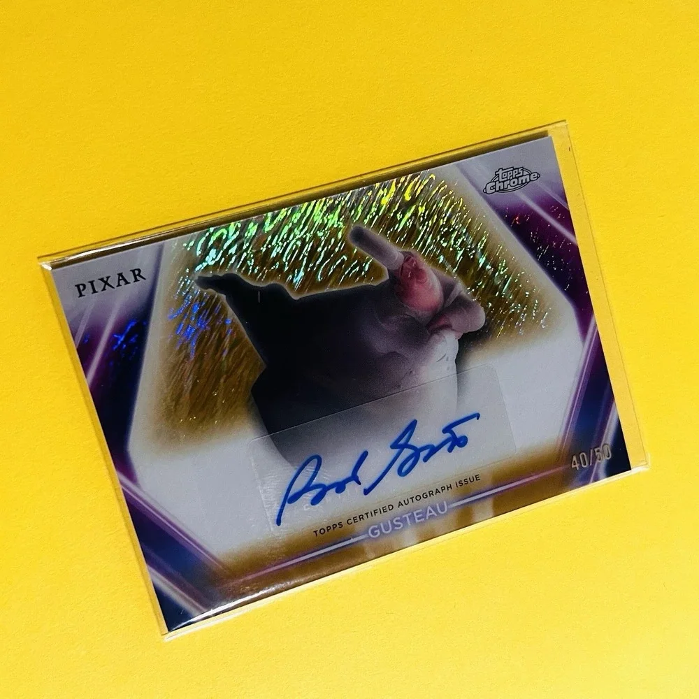 2026 Topps Disney Neon‎ Etch Auto Gold Shimmer #CNABG Brad Garrett Gusteau /50